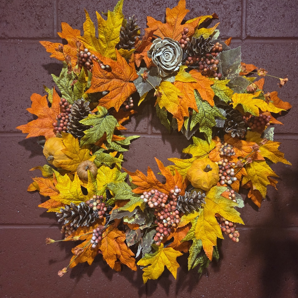 Festive Autumn Wreath with Pinecones, Pumpkins, and Berry